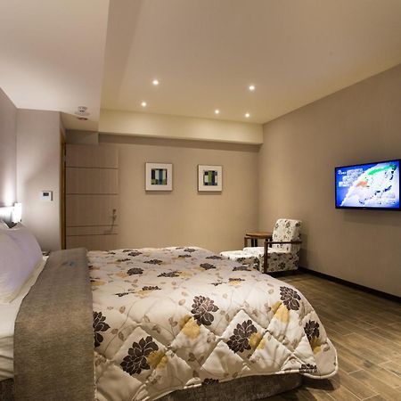 Verygood Business Hotel Huatan Room photo
