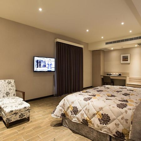 Verygood Business Hotel Huatan Room photo